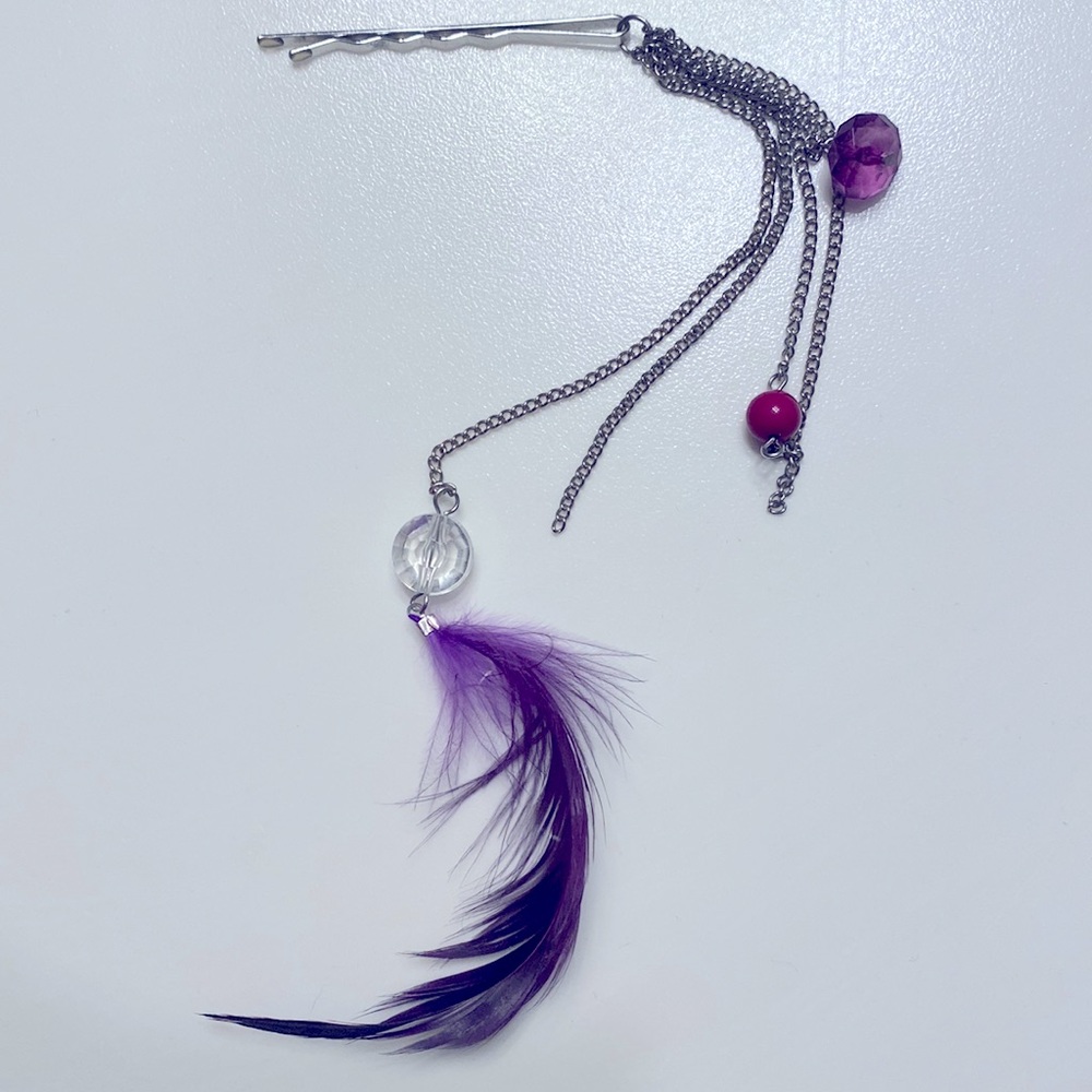 Purple feather hair accessory